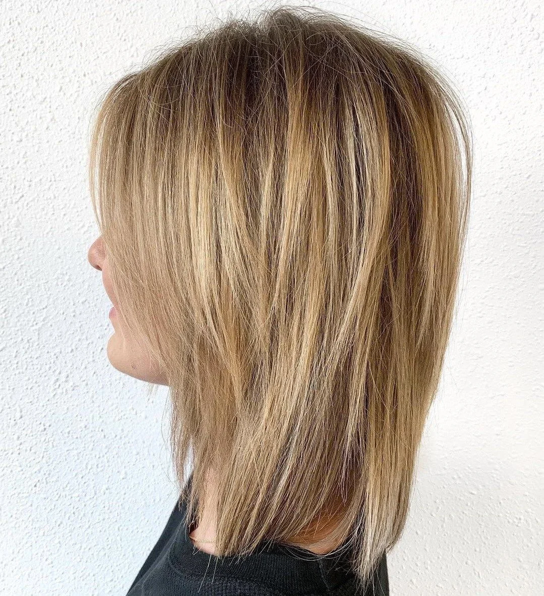 Corte largo en capas sin flequillo