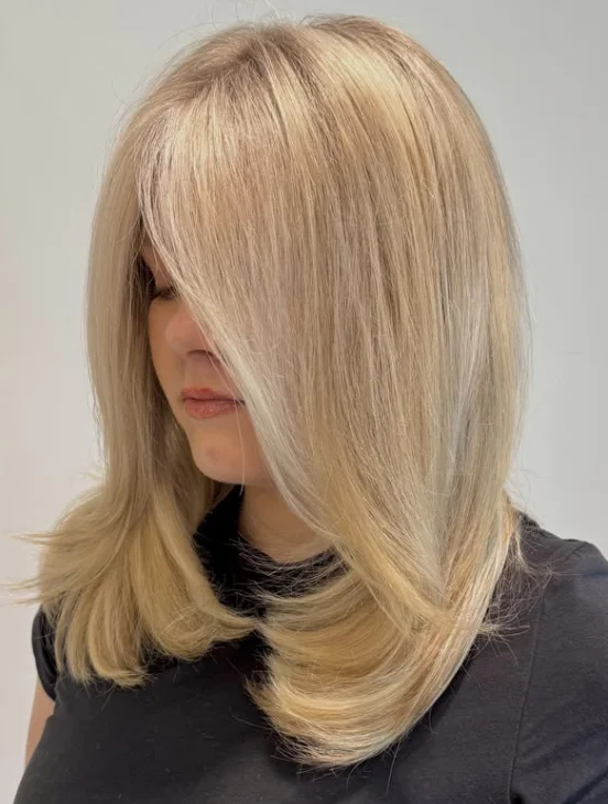 Corte en capas con flequillo cortina largo